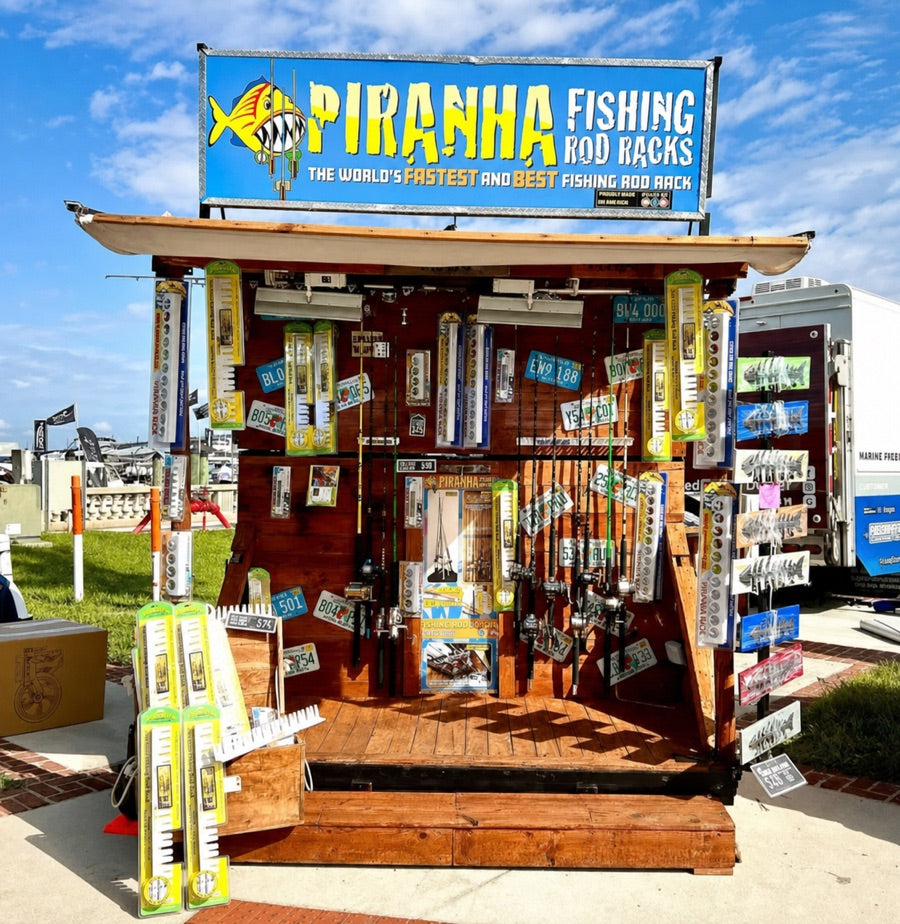 Piranha Rod Racks booth at a fishing event